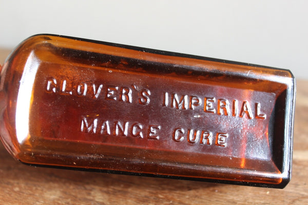 Fund Raiser - MEDICINE BOTTLE GLOVER'S MANGE MEDICINE Label Embossed Fine Condition